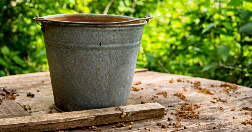 Metal bucket to signify business structure