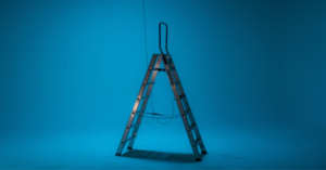 A DIY home improvement ladder on a blue background